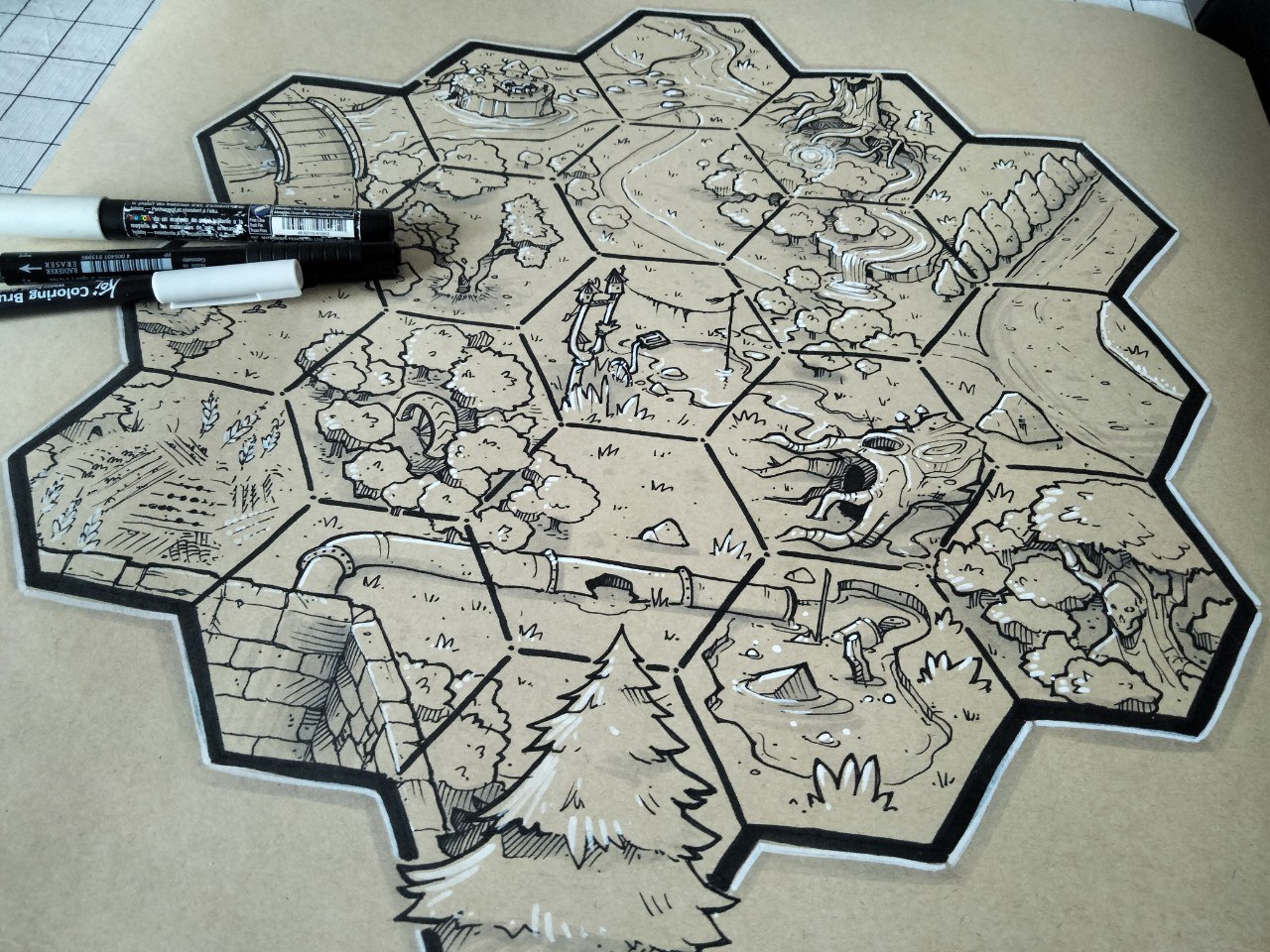 Map that Isaac Williams (creator of Mausritter) posted online using the  HEXCRAWL TOOLBOX by Games Omnivorous. The toolbox comes with 150 physical  tiles that you can use to create your own maps