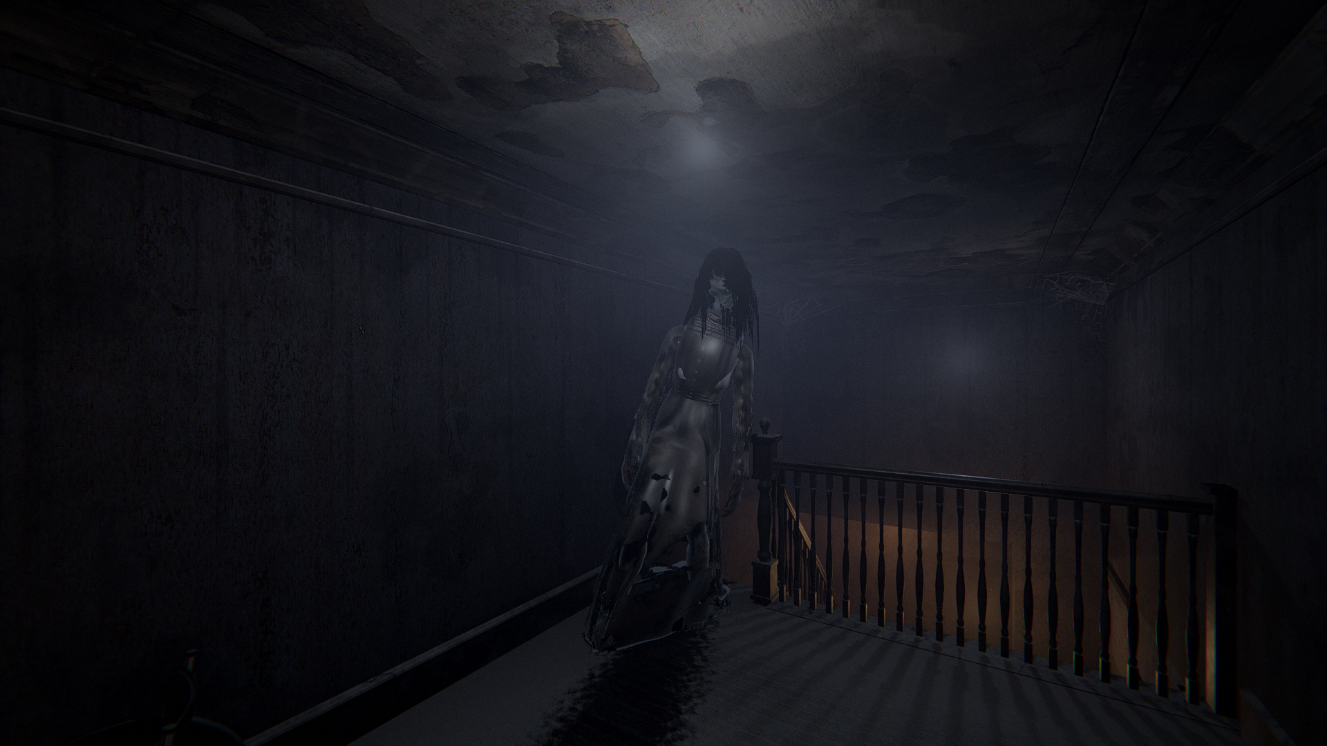 A figure on the stairs in the dark