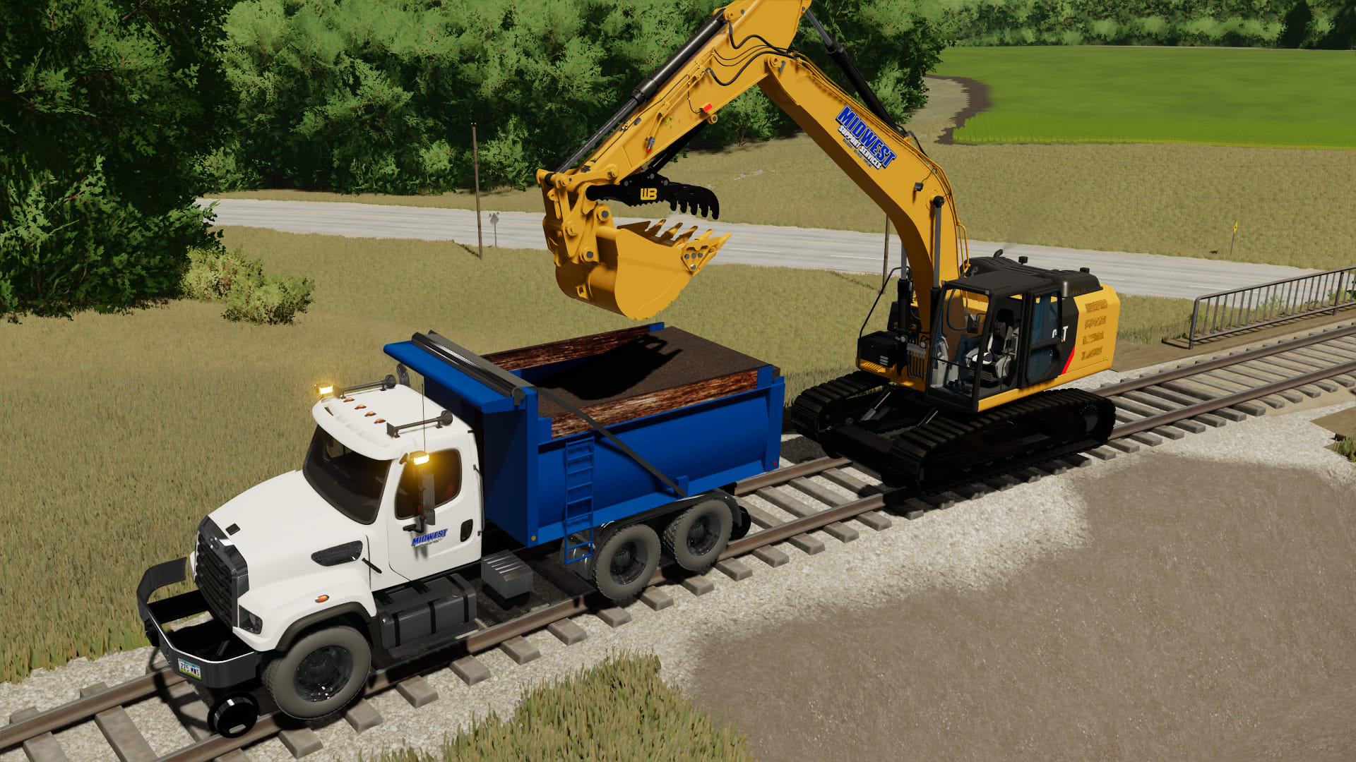 Caterpillar 323E Hi-Rail