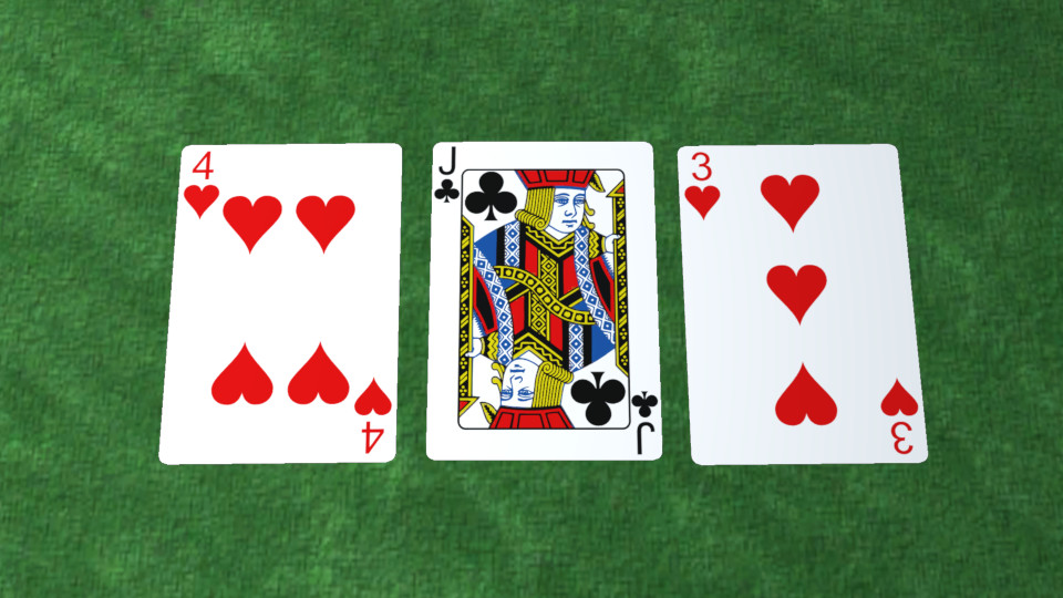 A set of three playing cards, each with curved corners