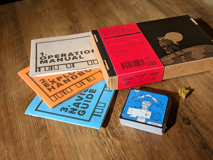 Photo of a physical box set of One Breath Left, with all its components laid out on a table.