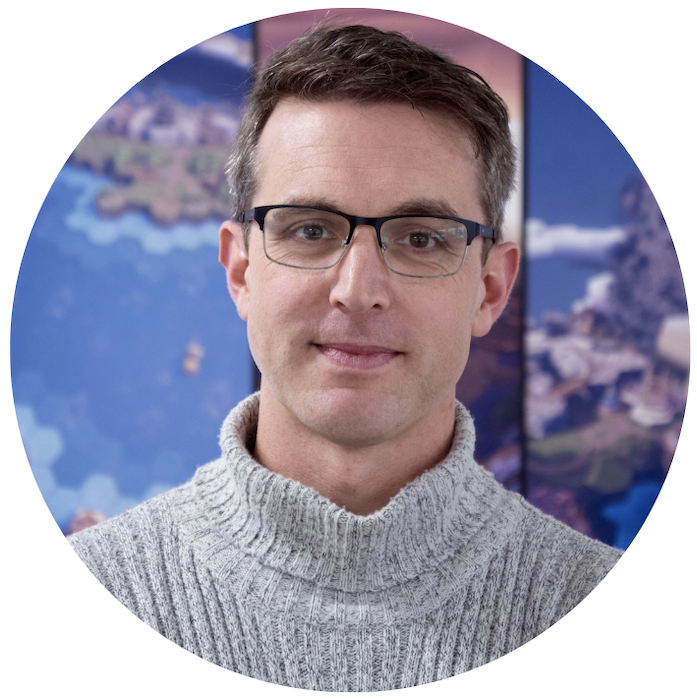 SAM is standing in front of a background from his game Before We Leave