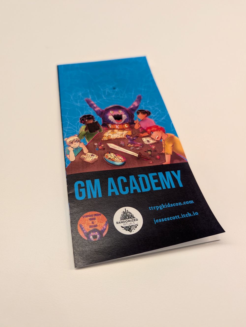 Cover image for GM Academy pamphlet