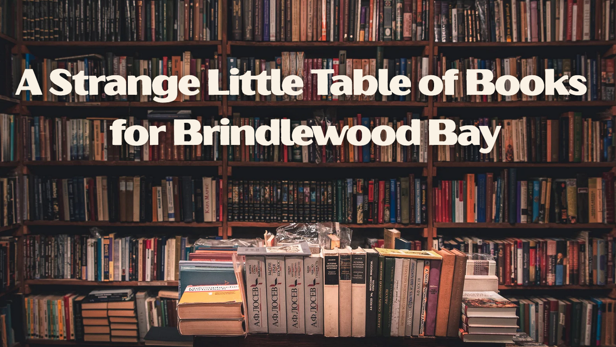 A Strange Little Table of Books for Brindlewood Bay