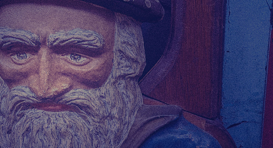 Photo of a mechanical fortune teller styled like a male wizard, shot at the Musee Mechanique in San Francisco.