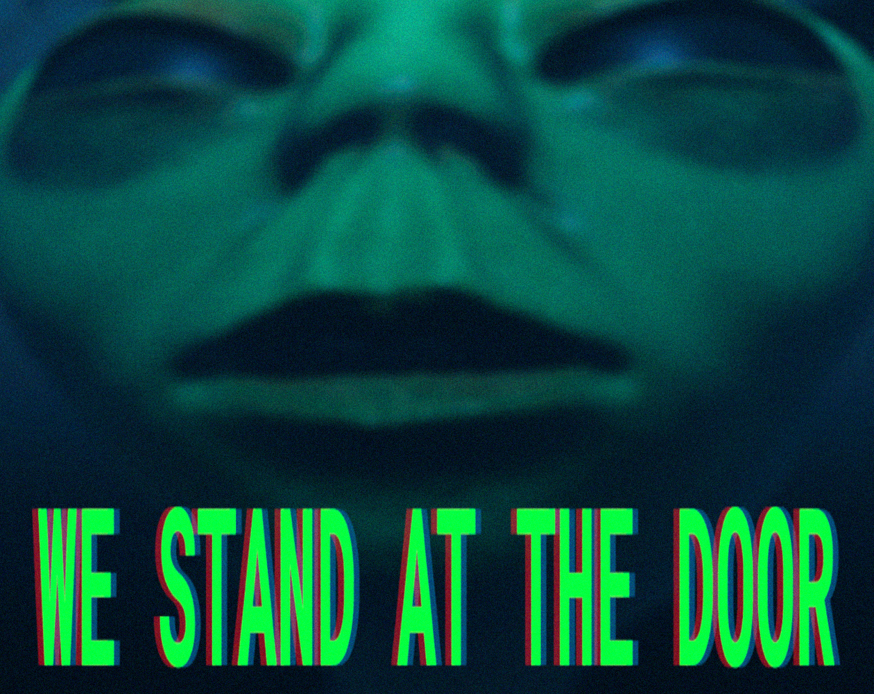 WE STAND AT THE DOOR cover