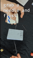 Pierce the spine and bind with floss.