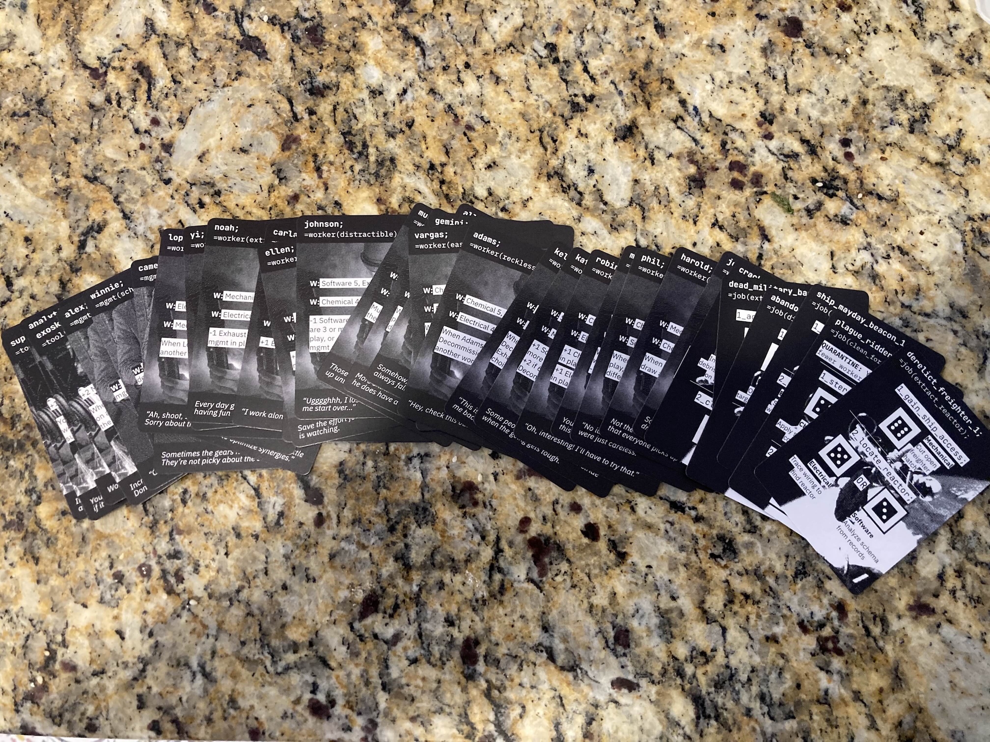 A set of cards spread out over a countertop.