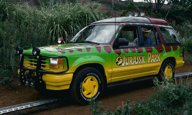 A classic jeep on rails fro Jurassic Park