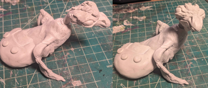 A photo of an unfinished sculpture of a bird monster hatching from a Tamagotchi style egg. A photo of an unfinished sculpture of a bird monster hatching from a Tamagotchi style egg.