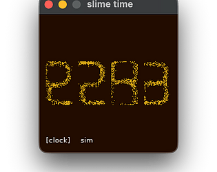 slime time clock in a window with slime-mold formed 7 segment display showing 22:43