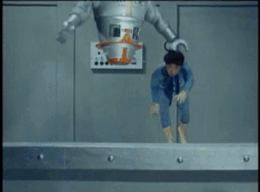 Boy held by evil robot in zero gravity as his friends watch and laugh