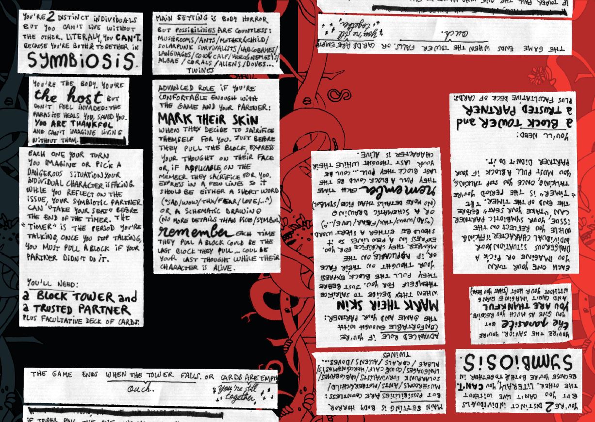Screenshot of the first draft of the game: black and red background with scanned papers on it, on which the rules of the game are written by hand